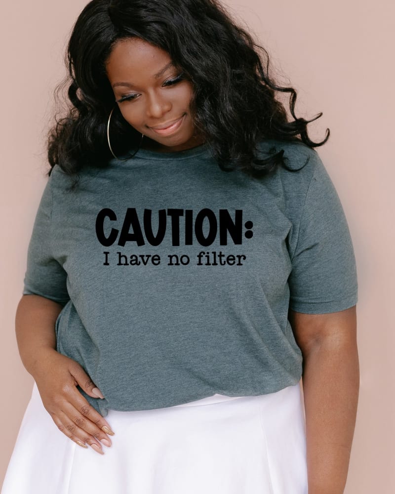Front of a model wearing a size Large Caution I Have No Filter in Forest by Simply Sage Market. | dia_product_style_image_id:281277